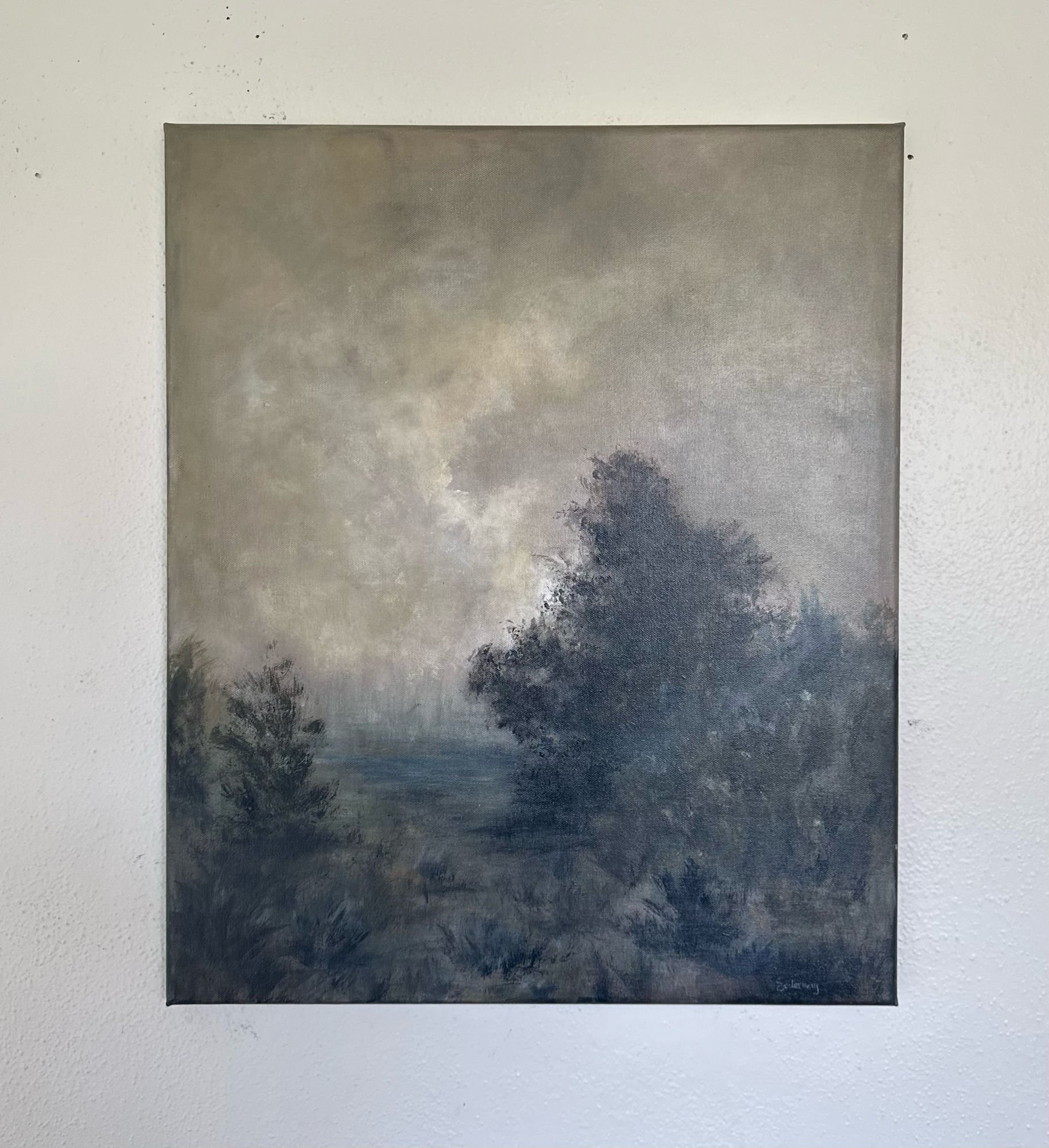 The Valley Over hung on a pale wall, signed in the lower right